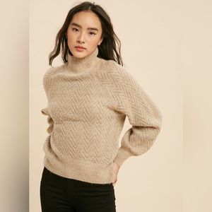 Boutique ivory herringbone turtleneck sweater
